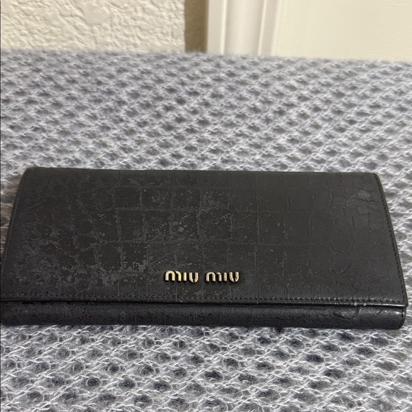 Miu Miu Handbags - Miu Miu Black Embossed Leather Wallet